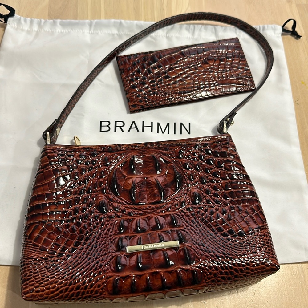 Small Brahmin clutch with checkbook cover in pecan. Like new.